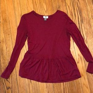 Maroon pendulum top